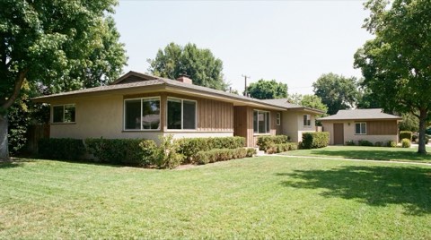 A single-story ranch home in Mar Vista with a small detached ADU visible in the backyard across a neat lawn