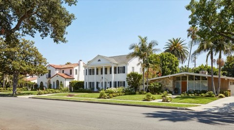 A Beverlywood street showing a mix of Spanish Revival, Colonial Revival, and ranch-style traditional homes