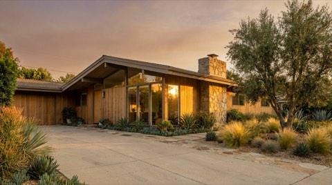 Front elevation of a classic mid-century modern ranch home in Studio City at late afternoon