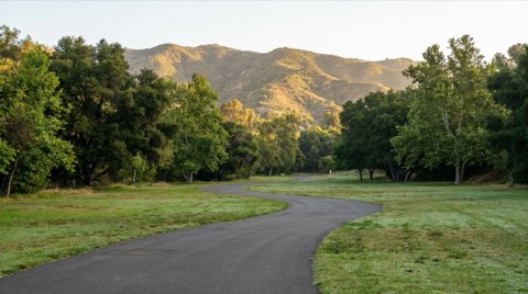 A quiet park trail in Culver City with the hills visible in the background.