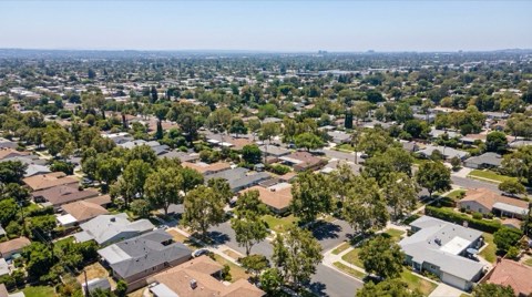 An aerial-style view over rooftops of a Studio City residential neighborhood at midday