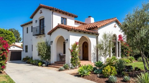 A crisp, market-ready Spanish style home in Los Feliz with fresh landscaping under bright midday light