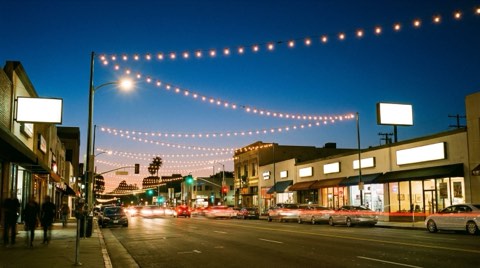 Downtown Culver City lit up in the evening, reflecting its nightlife and social scene.
