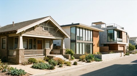 A residential street showing a mix of craftsman, mid-century, and contemporary beach home architecture