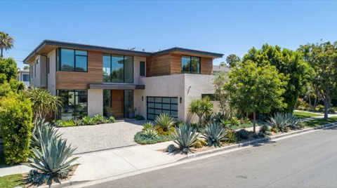 An upscale Santa Monica single-family home exterior in bright midday sunlight
