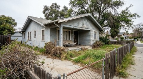 An older fixer-upper home exterior in Culver City in need of renovation.