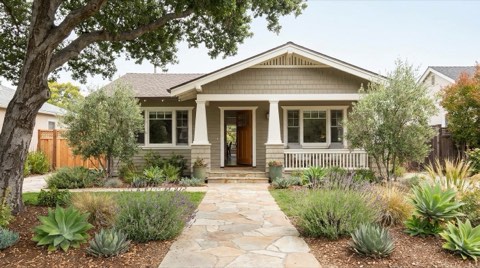 An inviting single-family home exterior with a clean walkway, ready for an open house